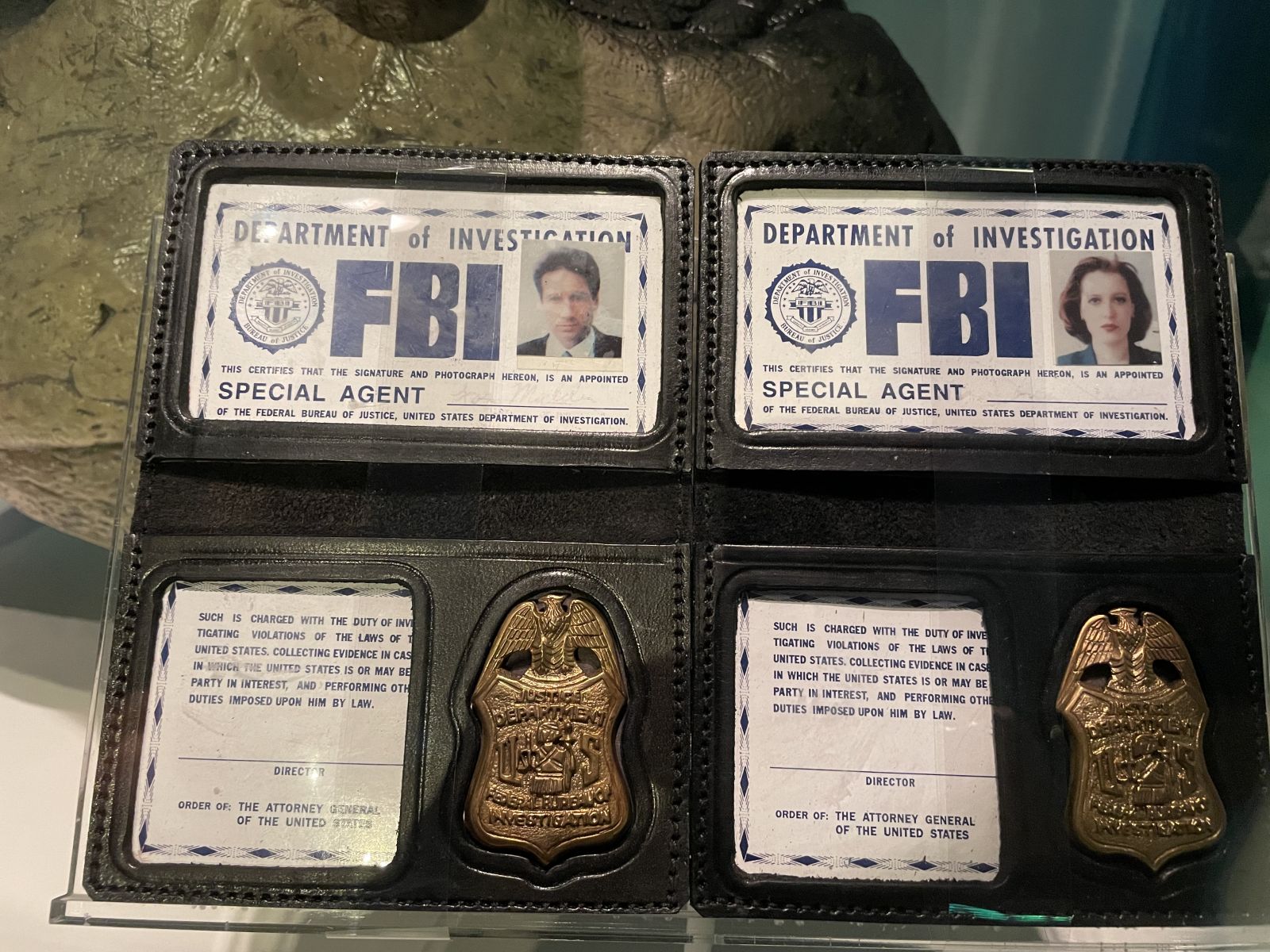 Scully and Mulder's ID passes from the X-Files, at the Museum of Pop Culture in Seattle. Scully and Mulder's ID passes from the X-Files, at the Museum of Pop Culture in Seattle.